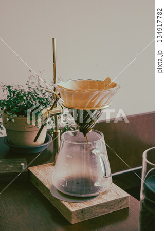 Hand Drip Coffee Extracting into Glass Server 134917782