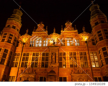 Historic building in Gdansk illuminated at night with bright colors Historic building in Gdansk illuminated at night with bright colors 134918109