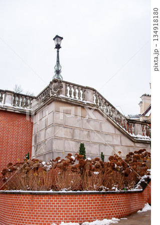 Stairs lead to a building in a historical site during winter season 134918180