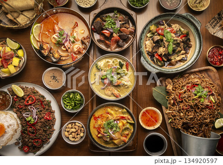 many different thai food dishes on table in modern restaurant in bangkok thailand 134920597