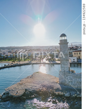 Egyptian lighthouse in the Venetian harbour of Rethymno and the waterfront of Crete most beautiful town. 134922569
