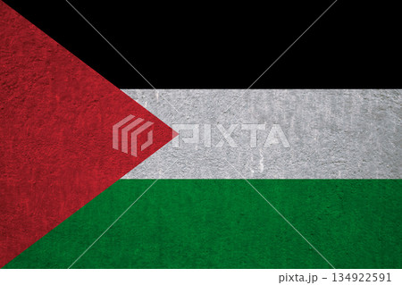 Flag of Palestine on an ancient concrete surface. Concept of Palestinian heritage and patriotism.. Flag of Palestine on an ancient concrete surface. Concept of Palestinian heritage and patriotism.. 134922591