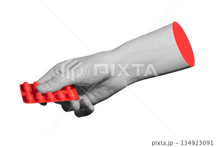 Blister pack of red tablets in hand. Symbol of drug prescription, medication, and pharmaceutical Blister pack of red tablets in hand. Symbol of drug prescription, medication, and pharmaceutical 134923091