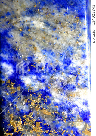 Close up of lapis lazuli blue and gold crystal gemstone harmony background 134923843