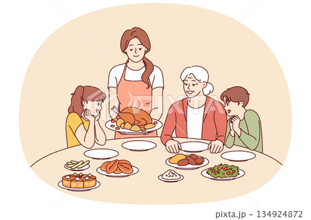 Family celebration of thanksgiving with joint dinner and delicious traditions turkey 134924872