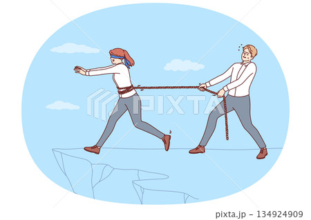 Man business mentor saves subordinate from failure, pulling rope tied to girl walking towards cliff 134924909