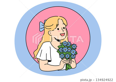 Little girl with bouquet wildflowers, rejoicing at change season or preparing flowers for mother day 134924922