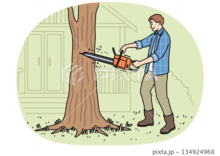 Man lumberjack uses chainsaw to get rid of old, diseased tree growing near house Man lumberjack uses chainsaw to get rid of old, diseased tree growing near house 134924968