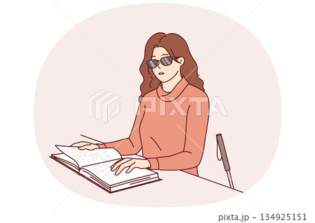 Blind woman reads braille book, using literature for people with disabilities to gain new knowledge Blind woman reads braille book, using literature for people with disabilities to gain new knowledge 134925151