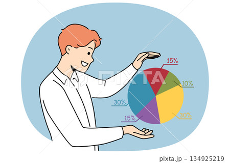 Man corporate analyst looks at diagram and smiles, seeing great diversification of business 134925219