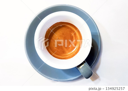 cup of espresso on white background, vertical photo cup of espresso on white background, vertical photo 134925257