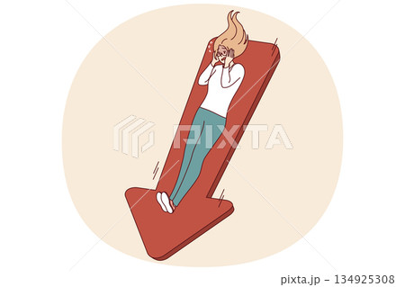 Frightened woman suffering from falling income and risk of bankruptcy, lying on down arrow Frightened woman suffering from falling income and risk of bankruptcy, lying on down arrow 134925308