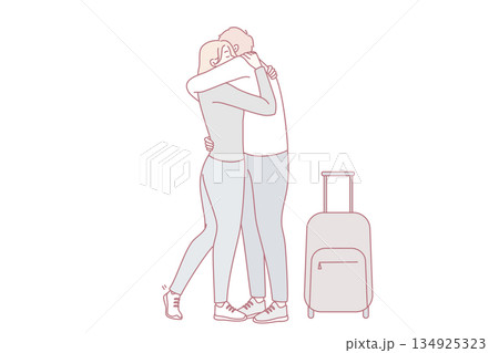 Woman hugging man with suitcase Woman hugging man with suitcase 134925323