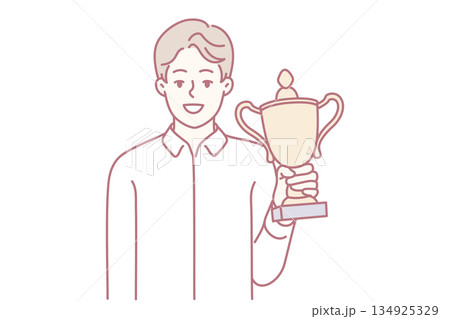 Proud award winner, Bright studio background highlights successful achievement celebration moment 134925329