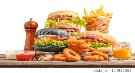 Fast food set with burgers, french fries, onion rings and sauces isolated on white background 134925592