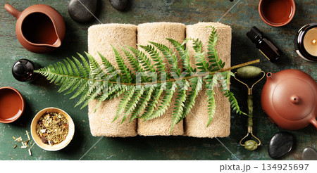 Luxury Spa Flatlay with Towels, Tea, and Natural Wellness Tools Luxury Spa Flatlay with Towels, Tea, and Natural Wellness Tools 134925697