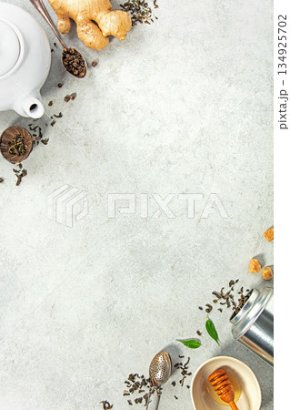 Tea Ingredients and Teapot Flat Lay with Ample Copy Space 134925702