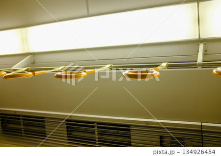 The inside view of Japan train. Train interior scene. Japan public transportation. Travel concept. The inside view of Japan train. Train interior scene. Japan public transportation. Travel concept. 134926484