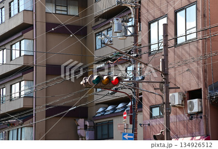 Close-up of the traffic light in Kyoto, Japan with streetscape. Transportation signal.  134926512