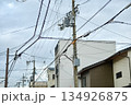 The view of utility pole, electric wires, electricity pylon at street in Kyoto, Japan.  134926875