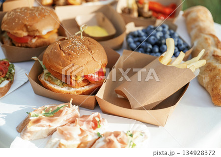 Close up view of bunch of tasty food in eco boxes, picnic time 134928372
