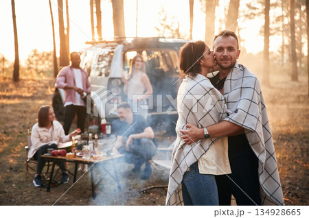 Conception of love, couple embracing each other. Group of friends are together in the forest 134928665