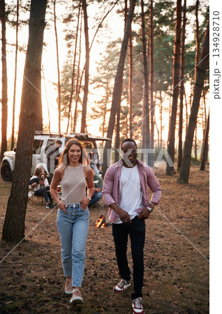Multiracial couple. Group of friends are together in the forest 134928710