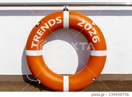 Trends 2026 new year symbol. Concept words Trends 2026 on beautiful orange lifebuoy. Beautiful white background. Beautiful orange lifebuoy. Business and Trends 2026 new year concept. Copy space. Trends 2026 new year symbol. Concept words Trends 2026 on beautiful orange lifebuoy. Beautiful white background. Beautiful orange lifebuoy. Business and Trends 2026 new year concept. Copy space. 134930758