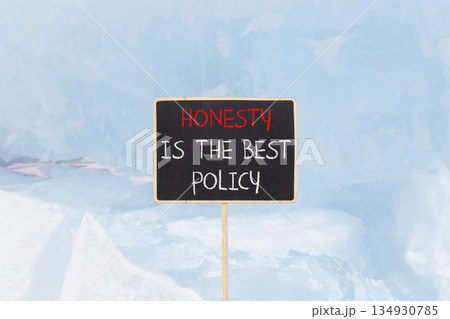 Honesty is the best policy symbol. Concept words Honesty is the best policy on beautiful blackboard. Beautiful blue Baikal ice background. Business honesty is the best policy concept. Copy space. Honesty is the best policy symbol. Concept words Honesty is the best policy on beautiful blackboard. Beautiful blue Baikal ice background. Business honesty is the best policy concept. Copy space. 134930785