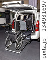 Innovative wheelchair-accessible van with a sleek ramp for smooth mobility. 134931697