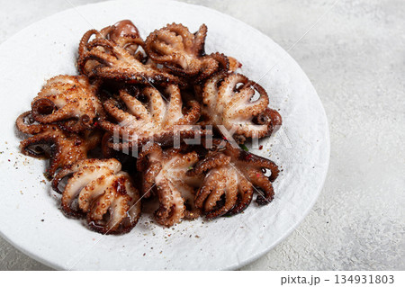 Baby octopus grilled on a white plate, homemade, no people, Baby octopus grilled on a white plate, homemade, no people, 134931803