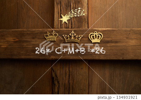 Epiphany door blessing with chalk and golden crowns Epiphany door blessing with chalk and golden crowns 134931921