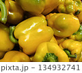 Yellow bell peppers displaying vibrant color and healthy texture, representing fresh produce, organic farming, and a nutritious food ingredient in cooking and healthy eating 134932741