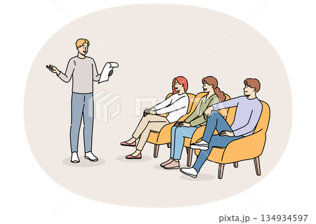 Poetry evening with man reading own poems, for positive listeners sitting in armchairs 134934597