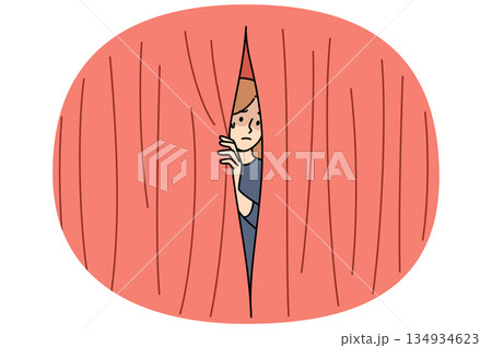 Woman experiences phobia of public speaking and looks out from behind scenes of theater 134934623