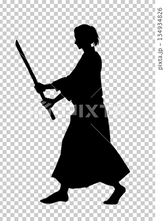 A man in a karate uniform holding a wooden sword (silhouette, black) 134934826