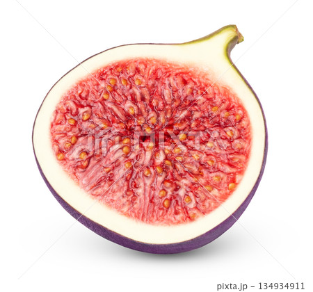 One slice of ripe purple fig fruit isolated. 134934911