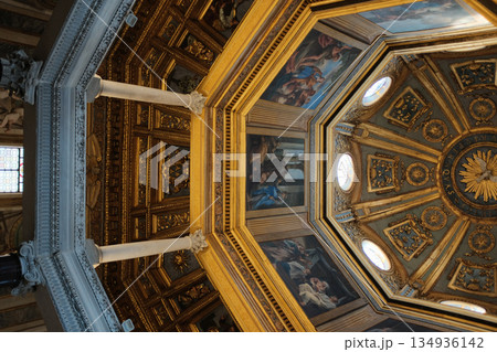 Archbasilica of Saint John Lateran interior Rome golden coffered ceiling marble columns statues ornate chapels baptistery and apse Catholic basilica Italy. High quality photo 134936142