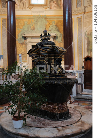 Archbasilica of Saint John Lateran interior Rome golden coffered ceiling marble columns statues ornate chapels baptistery and apse Catholic basilica Italy. High quality photo Archbasilica of Saint John Lateran interior Rome golden coffered ceiling marble columns statues ornate chapels baptistery and apse Catholic basilica Italy. High quality photo 134936158