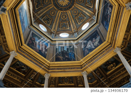 Archbasilica of Saint John Lateran interior Rome golden coffered ceiling marble columns statues ornate chapels baptistery and apse Catholic basilica Italy. High quality photo 134936170