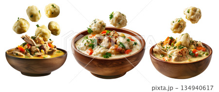 Hearty chicken and dumplings soup with peas and carrots in wooden bowl, floating dumplings, isolated on white background Hearty chicken and dumplings soup with peas and carrots in wooden bowl, floating dumplings, isolated on white background 134940617