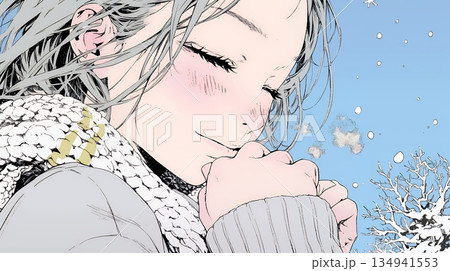 かじかんだ手に息を吹きかけて温めている若い女性