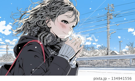 かじかんだ手に息を吹きかけて温めている若い女性