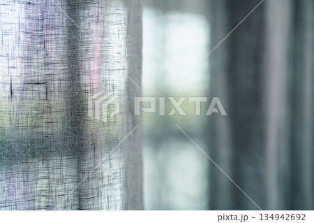 Closeup of linen curtains on a window 134942692