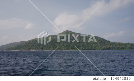 Sailing on a boat around Seychelles island in January 134942839