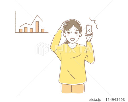 資産運用の下落グラフを見て慌てる女性とスマホ 134943498