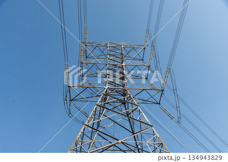 High voltage power poles from power plants. High voltage power poles from power plants. 134943829