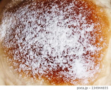 Powdered sugar pastry bun. Close up dessert. Powdered sugar pastry bun. Close up dessert. 134944655