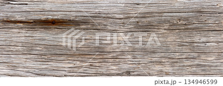 Weathered aged wooden board showing rustic texture 134946599