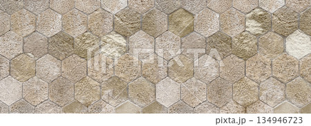 Hexagon stone tiles creating textured mosaic pattern Hexagon stone tiles creating textured mosaic pattern 134946723
